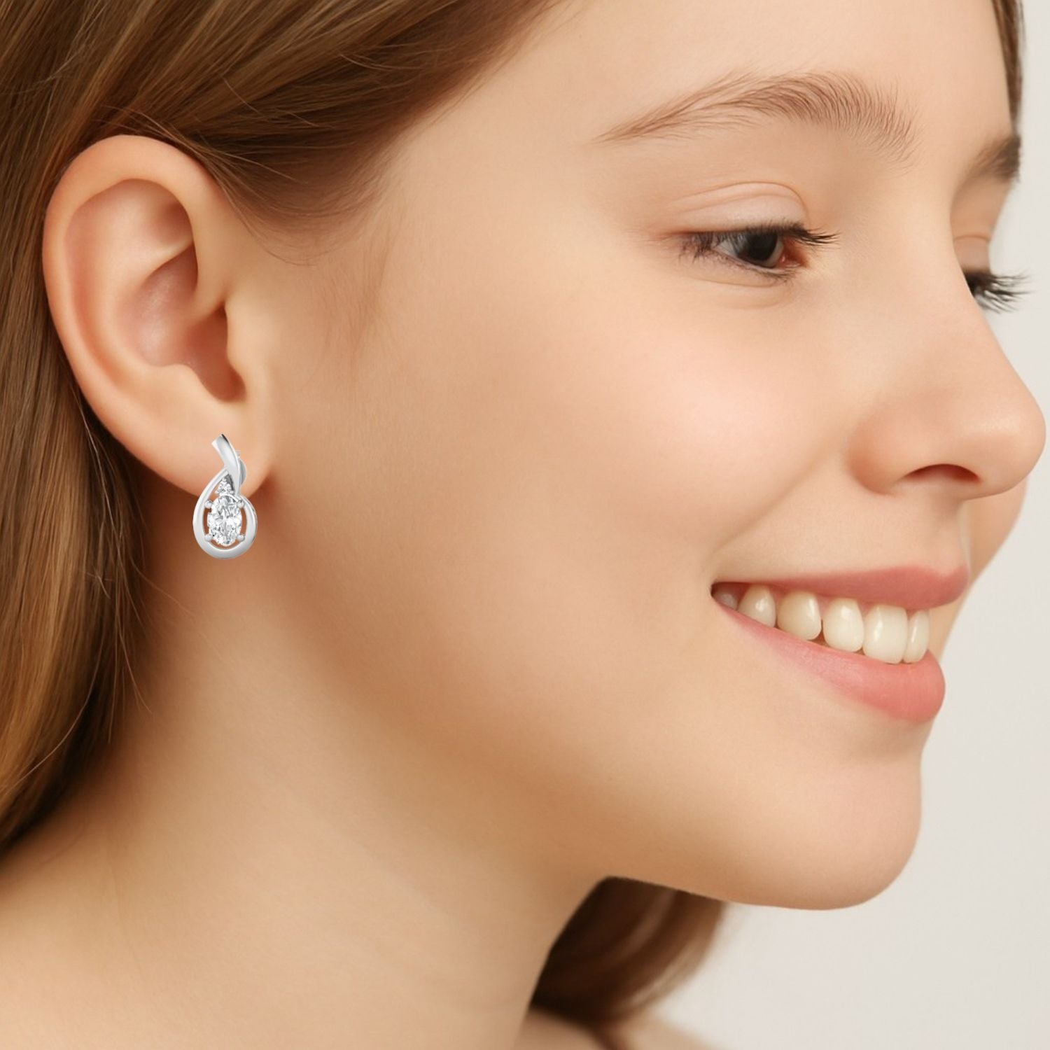 Moissanite Teardrop Twist Design Earrings – Sterling Silver