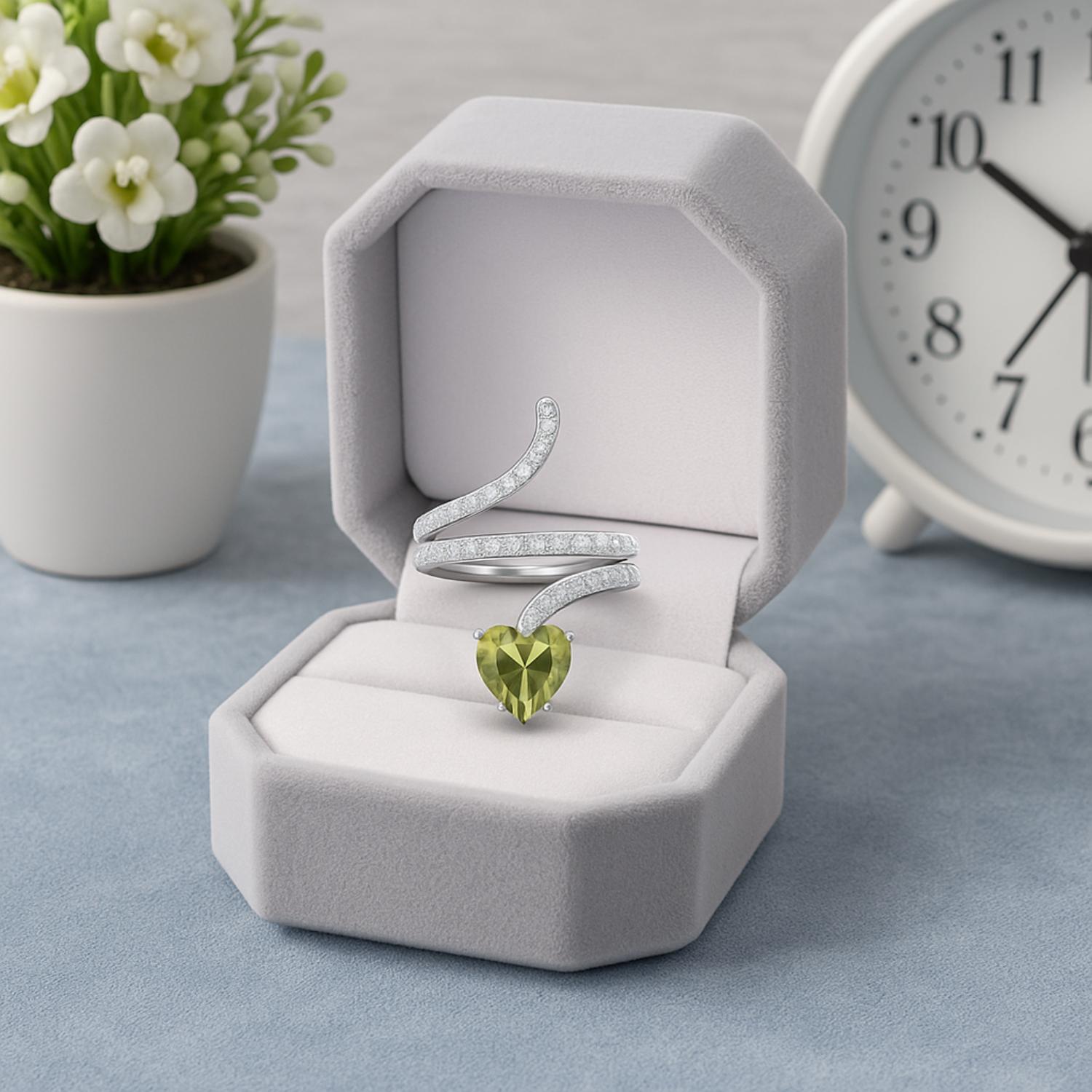 Anello con fascia a spirale in peridoto e pavé – Argento Sterling