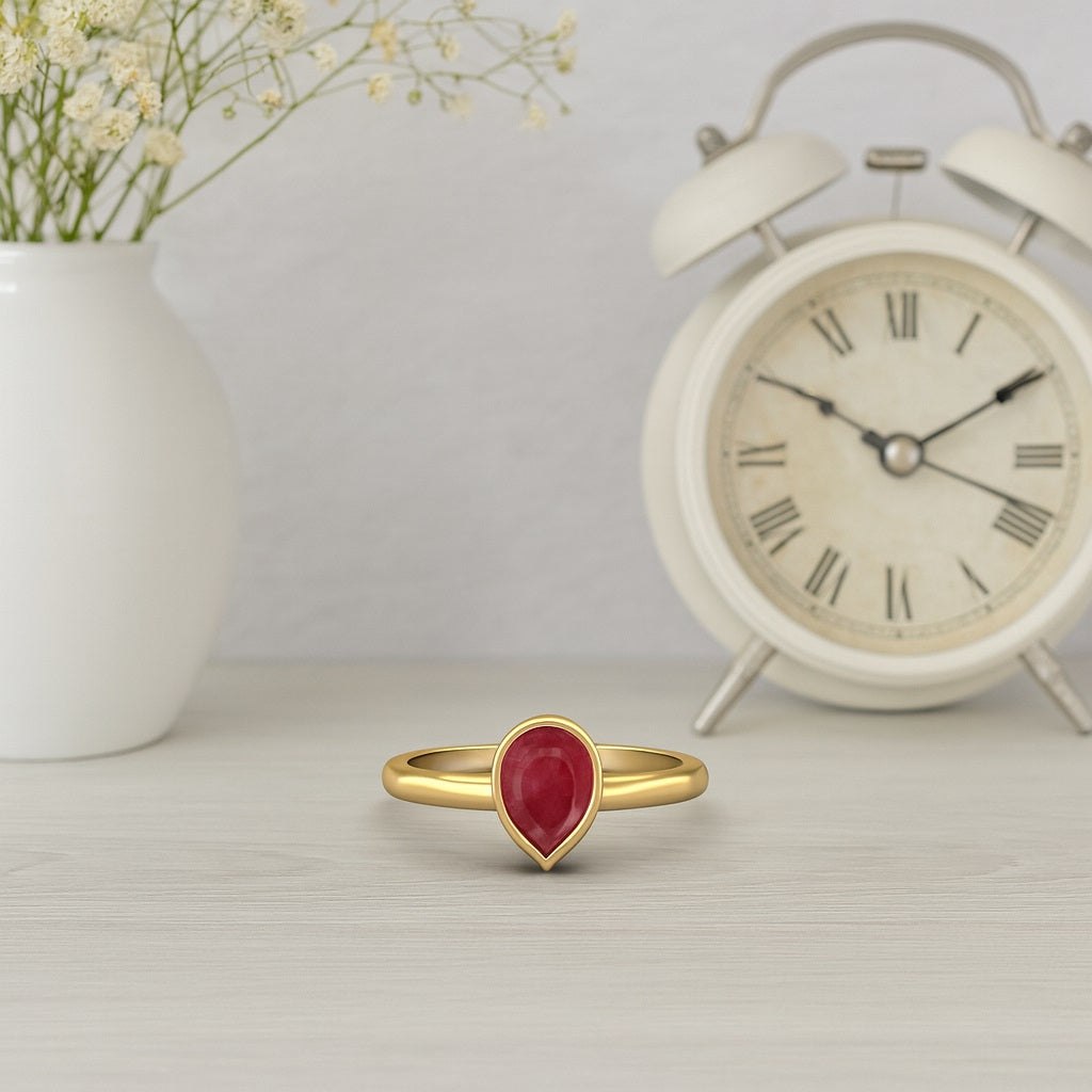 Ruby 0.75 Ct Pear Minimalist Bezel Solitaire Ring - 14k Yellow Gold