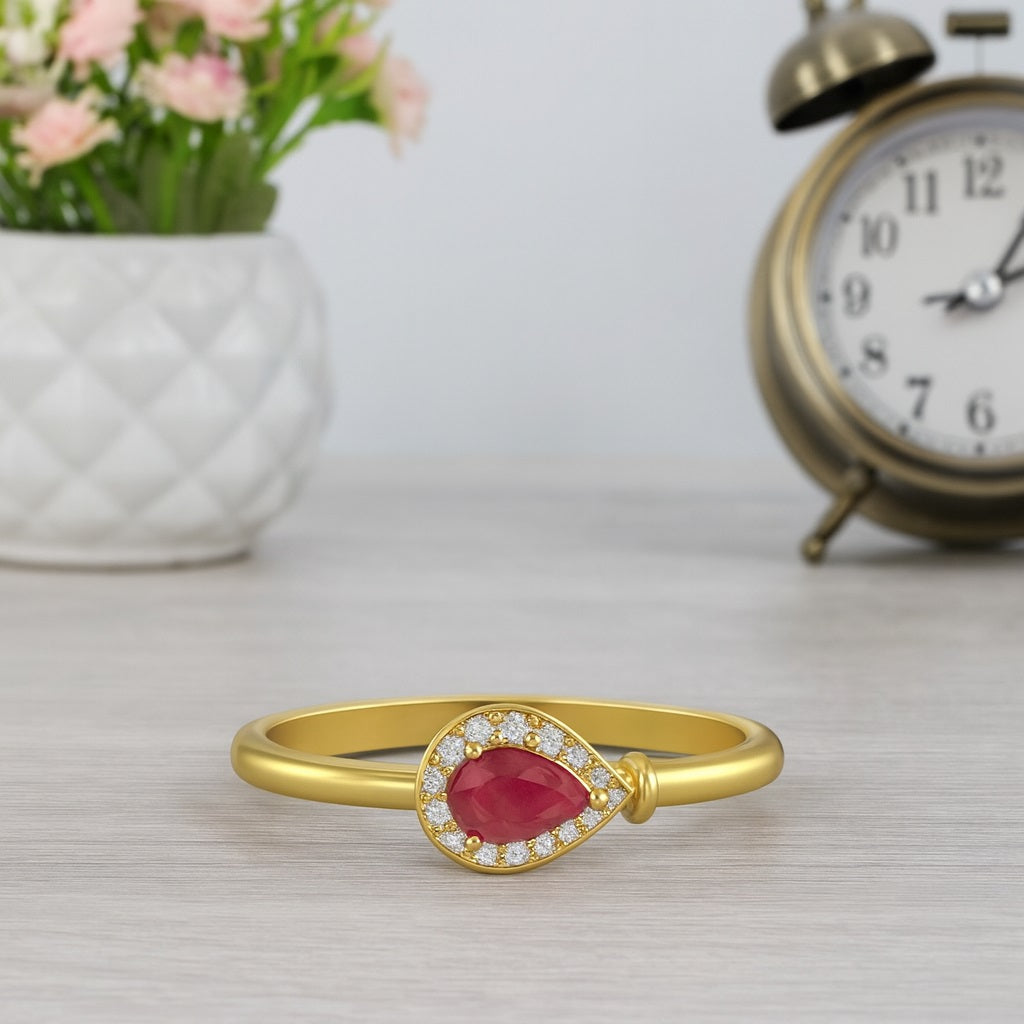 Ruby 0.70 Ct Pear Solitaire Halo Ring – 14k Yellow Gold