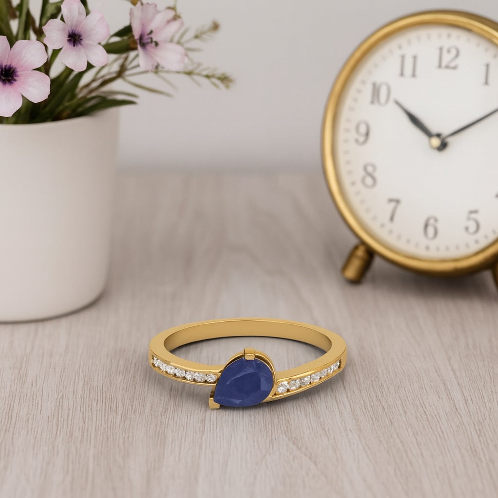 Blue Sapphire 0.75 Ct Pear Solitaire Ring - 14k Yellow Gold