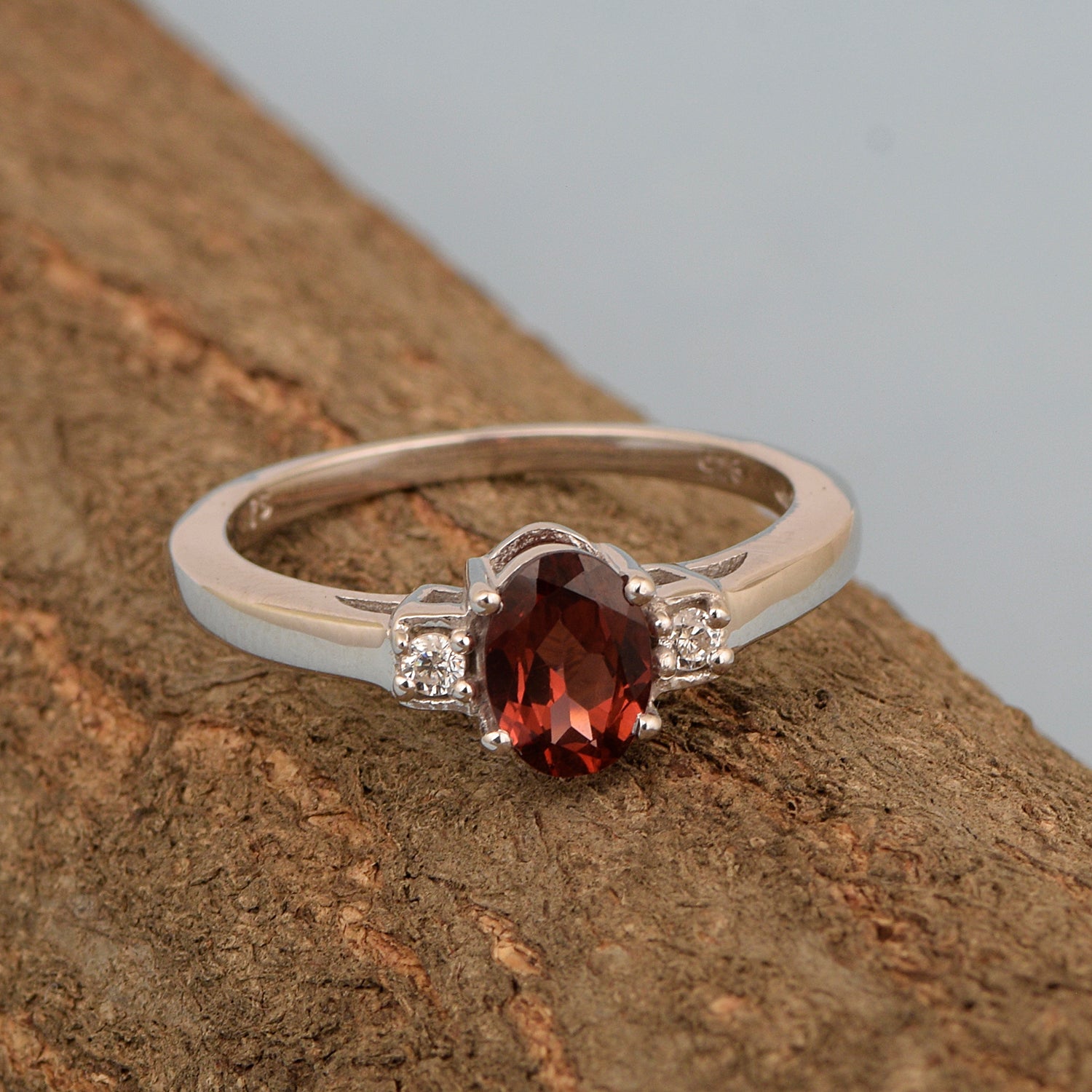 Garnet Oval and White Topaz Accent Ring - Sterling Silver