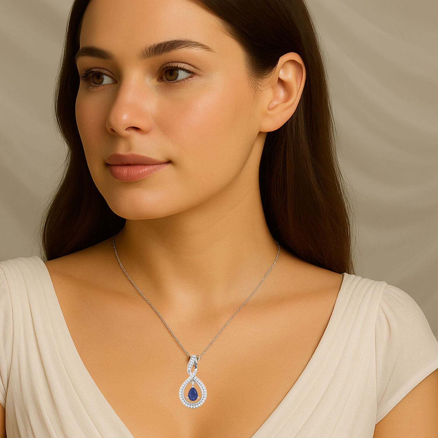 Blue Sapphire Infinity Teardrop Pendant - Sterling Silver