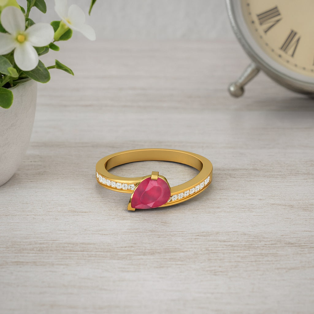 Ruby 0.75 Ct Pear Cut Solitaire Accents Ring – 14k Yellow Gold